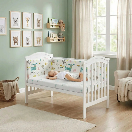 enfant dort dans son lit avec tour de lit gazelle