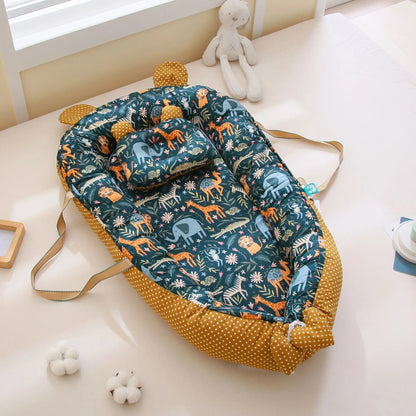 réducteur de lit bébé chocolat