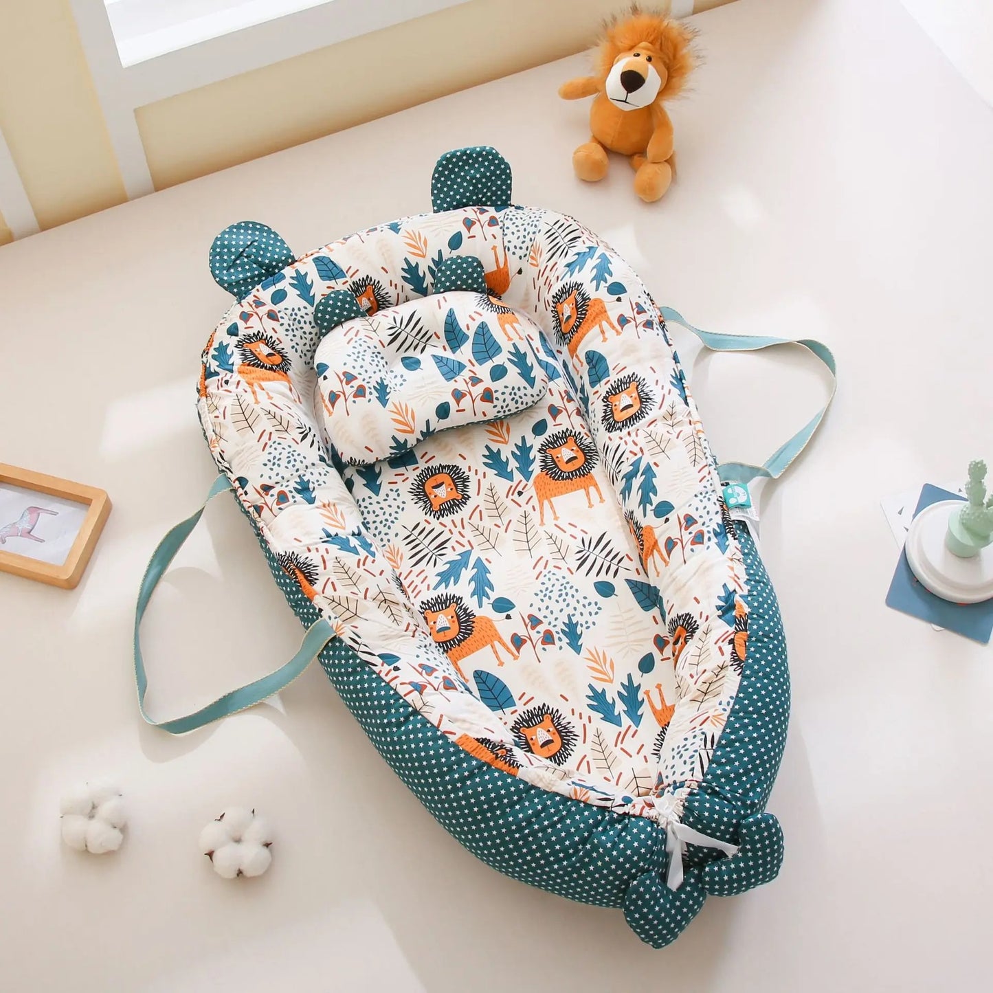 réducteur de lit bébé vert