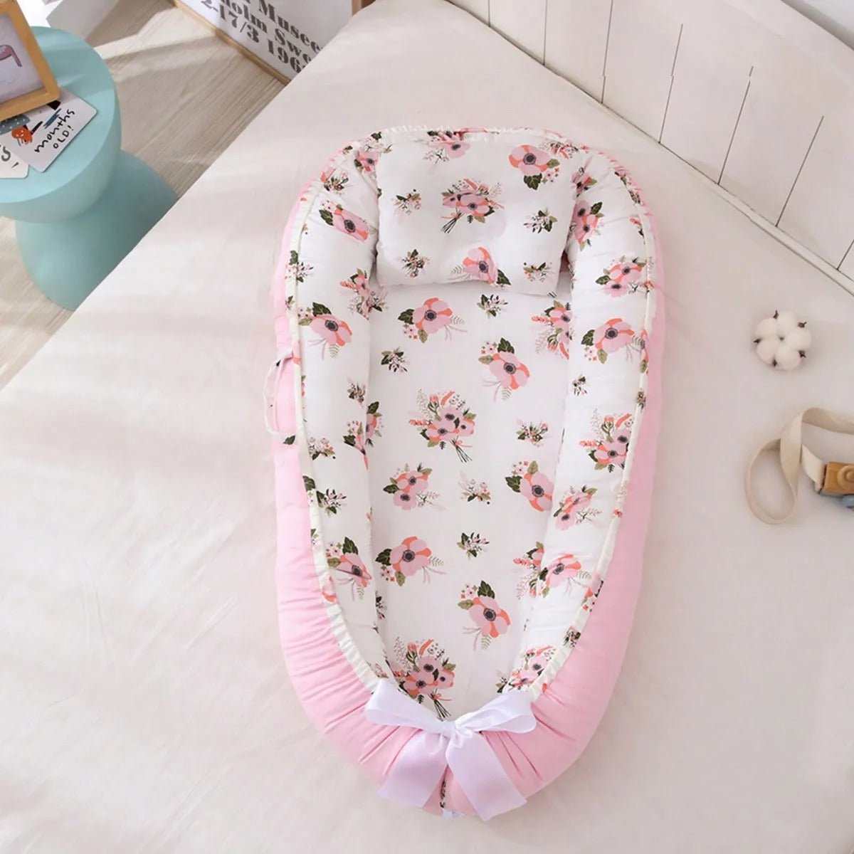 Reducteur de lit rose